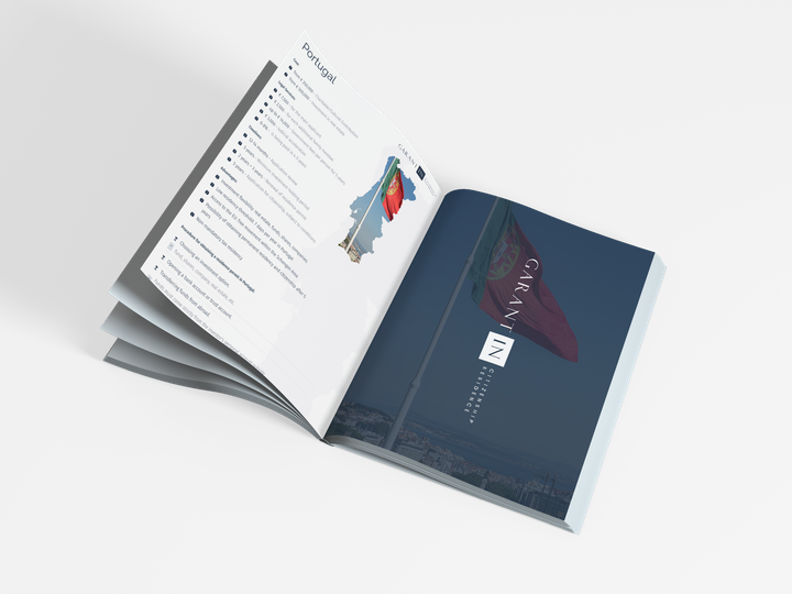 $Guide to obtaining a Portugal Residence Permit on table